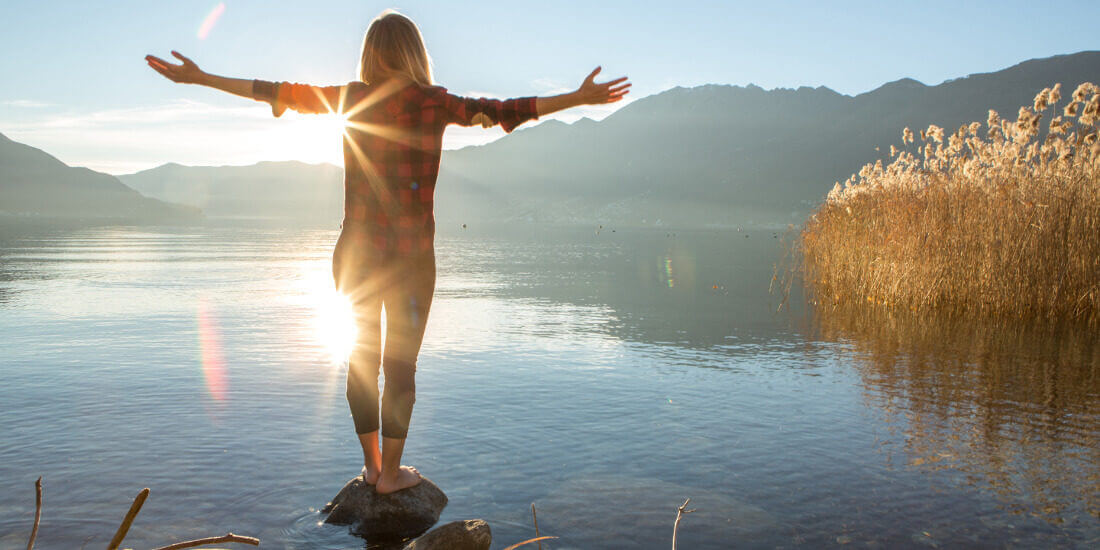 Woman by lake